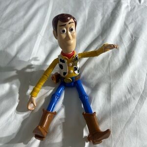 Mattel Woody Toy Story Cowboy Action Figure with Blue Pants and Brown Boots